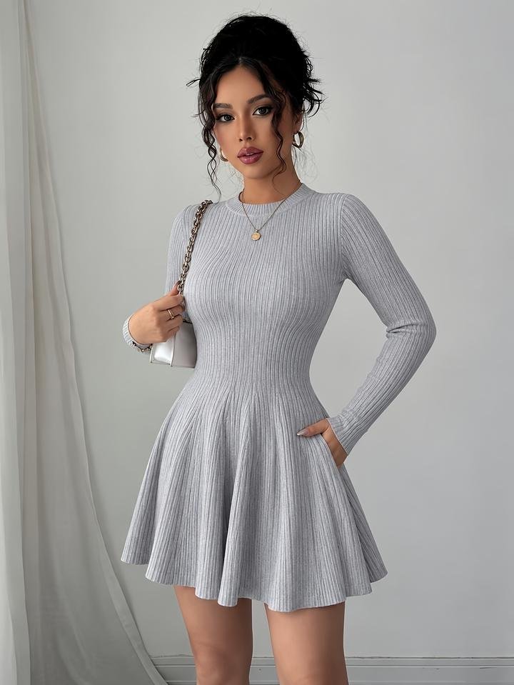 Women's grey ribbed long sleeve slim fit mini dress with a flattering A-line shape